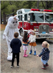 2025EasterEggHunt - EB With Children at arrival