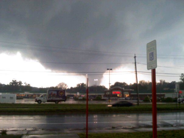 Tornado behind a shopping center